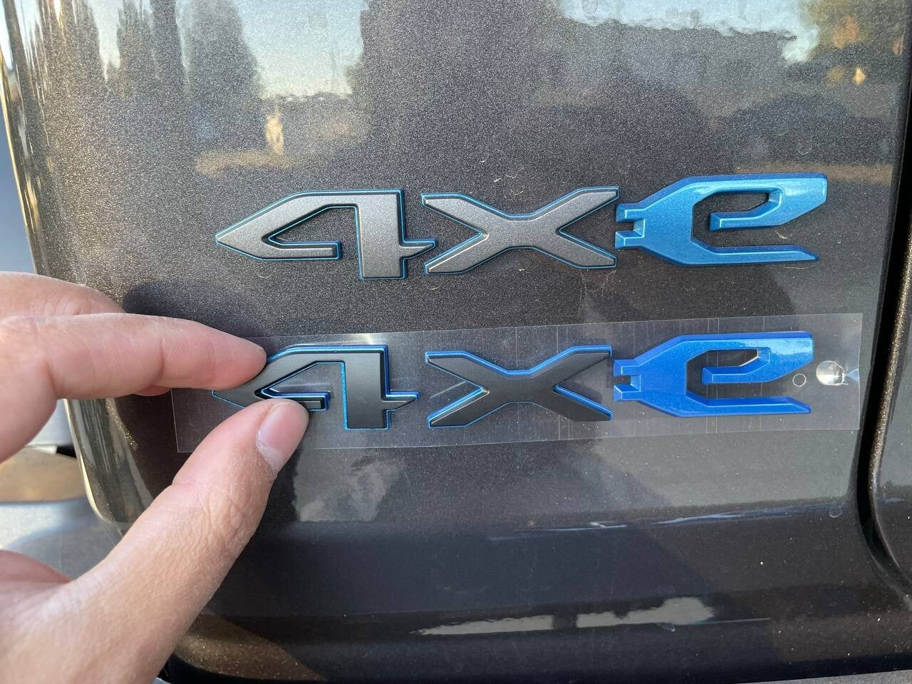 NEW - 2020-24 - 68412009AB - JEEP WRANGLER 4XE TAILGATE MATTE GRAY EMBLEM