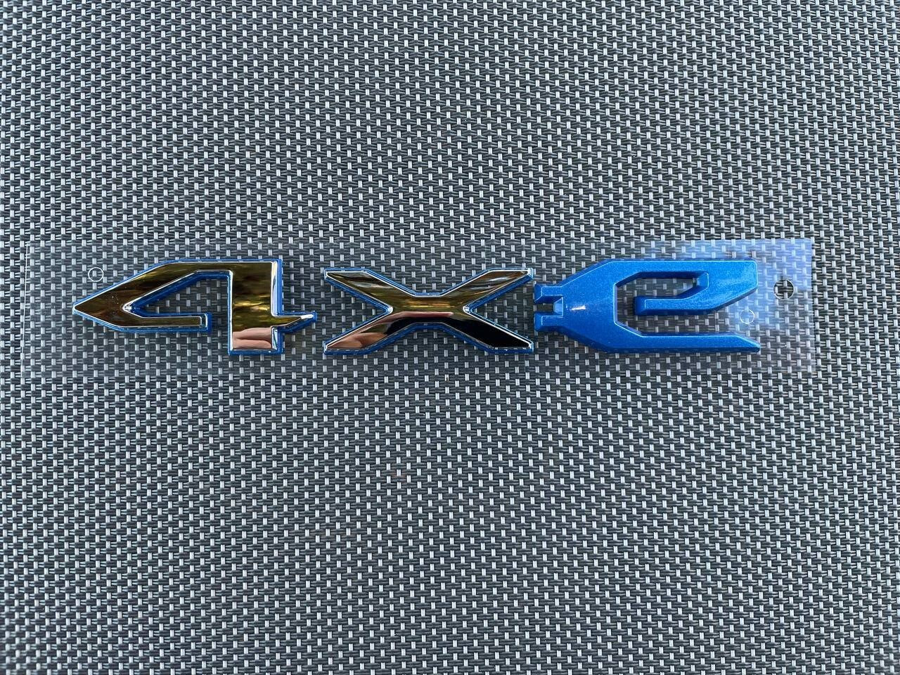 NEW - 2020-24 - 68412009AB - JEEP WRANGLER 4XE TAILGATE SILVER GRAY EMBLEM